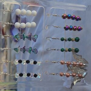 Seven Pairs Of Earrings.  Includes Rack. Crystals, Rainbow Stone, Butterflies.